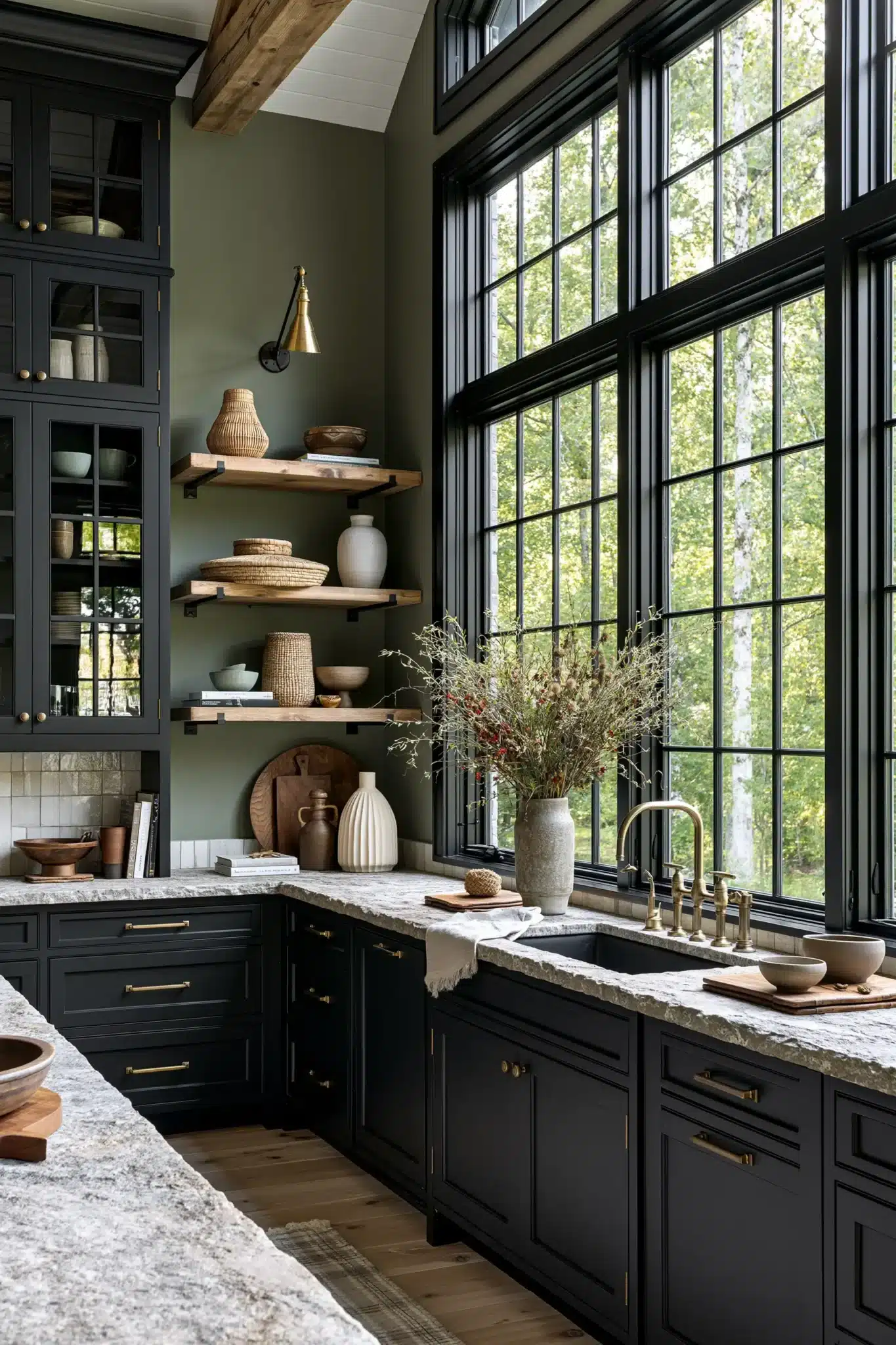 sage green and black kitchen